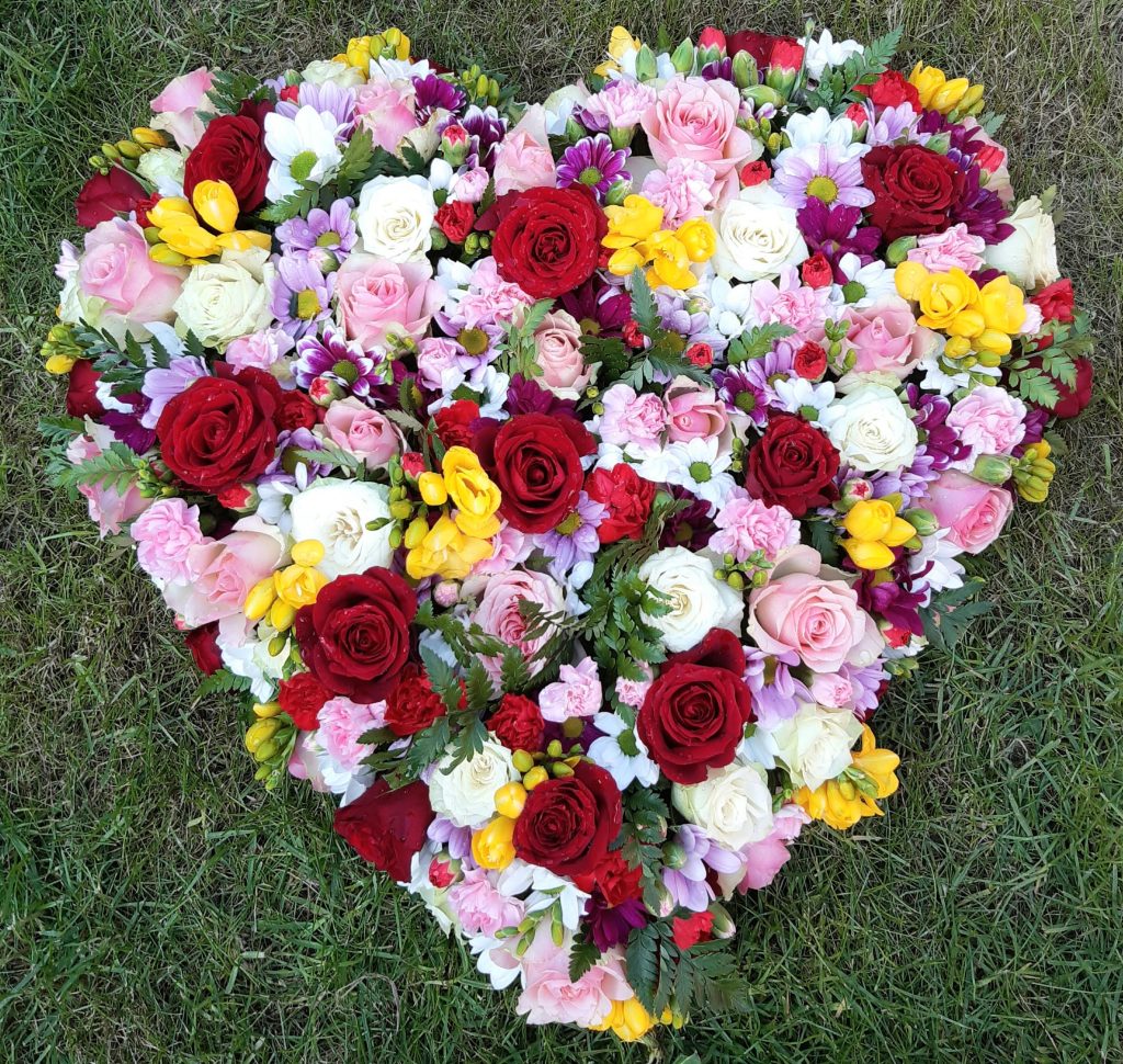 Floral Heart Tribute – Classic Heart-Shaped Funeral Arrangement