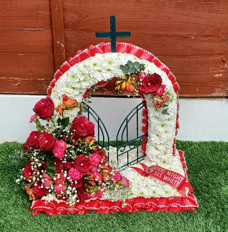 Gates of Heaven Floral Tribute – Symbolic Religious Funeral Arrangement